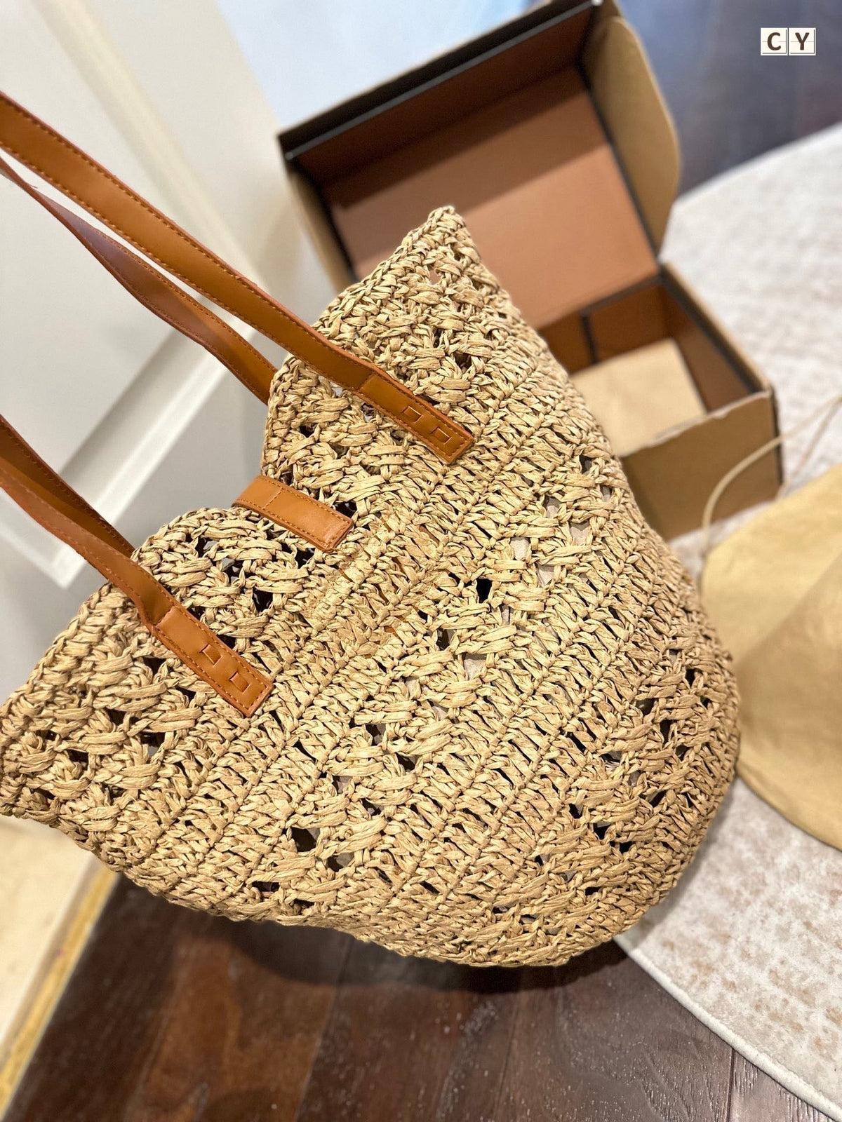 ysl-panier-medium-in-raffia-and-vegetable-tanned-leather Tote